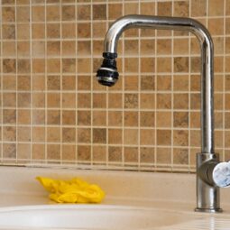 faucet line leaking under kitchen sink