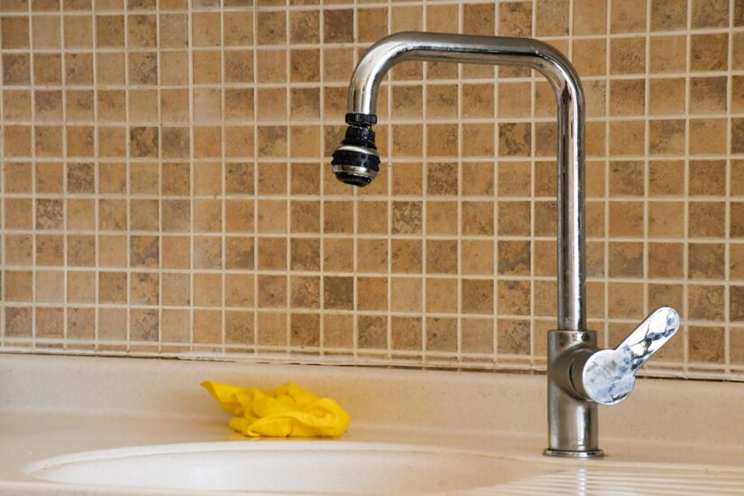 faucet line leaking under kitchen sink